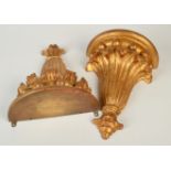 A pair of Italian giltwood, half round, acanthus leaf and ball carved brackets.