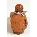 A Chinese carved walnut snuff bottle, height 6cm.