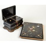 A Victorian black papier mache and mother of pearl inlaid, two section tea caddy and a similar