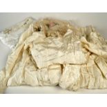 A 1930's silk wedding dress, a Victorian wedding apron and a Victorian nightgown.
