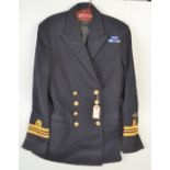 A Royal Navy Fleet Air Arm Reserves Lieutenant Commander's uniform jacket.