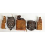 Two Chinese soapstone seals and another seal, together with two Japanese miniature metal masks.