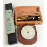 A Fowler's universal calculator with leather pouch,