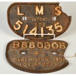 An L.M.S. cast iron wagon plate, 12 tonnes STD.