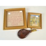 A small alphabet sampler dated 1821, a leather and brass shot flask and a small coloured print.