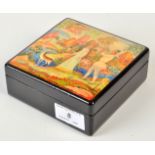 A Russian lacquered box, the lid painted with a piper and girl watched by a deer in a landscape