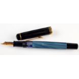 A Pelikan black and blue marble fountain pen with M nib.