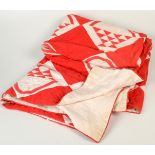 A West Country red and white geometric patchwork quilt, 183 x 175cm. Condition Report: Some minor