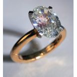 An exceedingly fine solitaire diamond ring with an 14ct yellow gold Jacob Newman & Co expanding