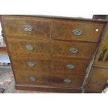 A mahogany chest of drawers with satinwood cross banding, width 115cm.