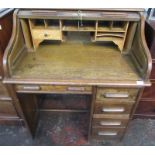 An oak, roll top desk, width 78cm.