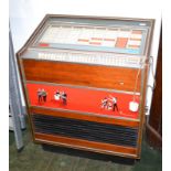 A 1960/70s N.S.M. Serenade, Discotheque stainless steel and wood effect, coin operated juke box. The