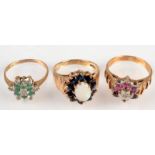 Three 9ct. gold cluster rings.