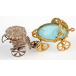 A silver filigree bath chair and a gilt metal mounted pale blue glass ring chariot.