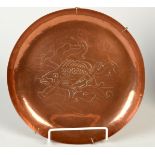 A Newlyn Copper shallow bowl decorated with fish and seaweed. Impressed Newlyn. Diameter 23.5cm.