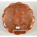 A Hayle, J. & F.Pool Copper lobed circular tray, relief decorated with a longboat. No.