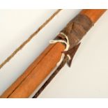 A Tanzania 'Hadza' tribe bow and arrow, length of bow 166cm.