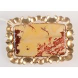 A Victorian moss agate gold mounted brooch.
