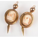 A pair of Victorian gold cameo earrings, each carved with Hebe feeding the eagle Olympus.