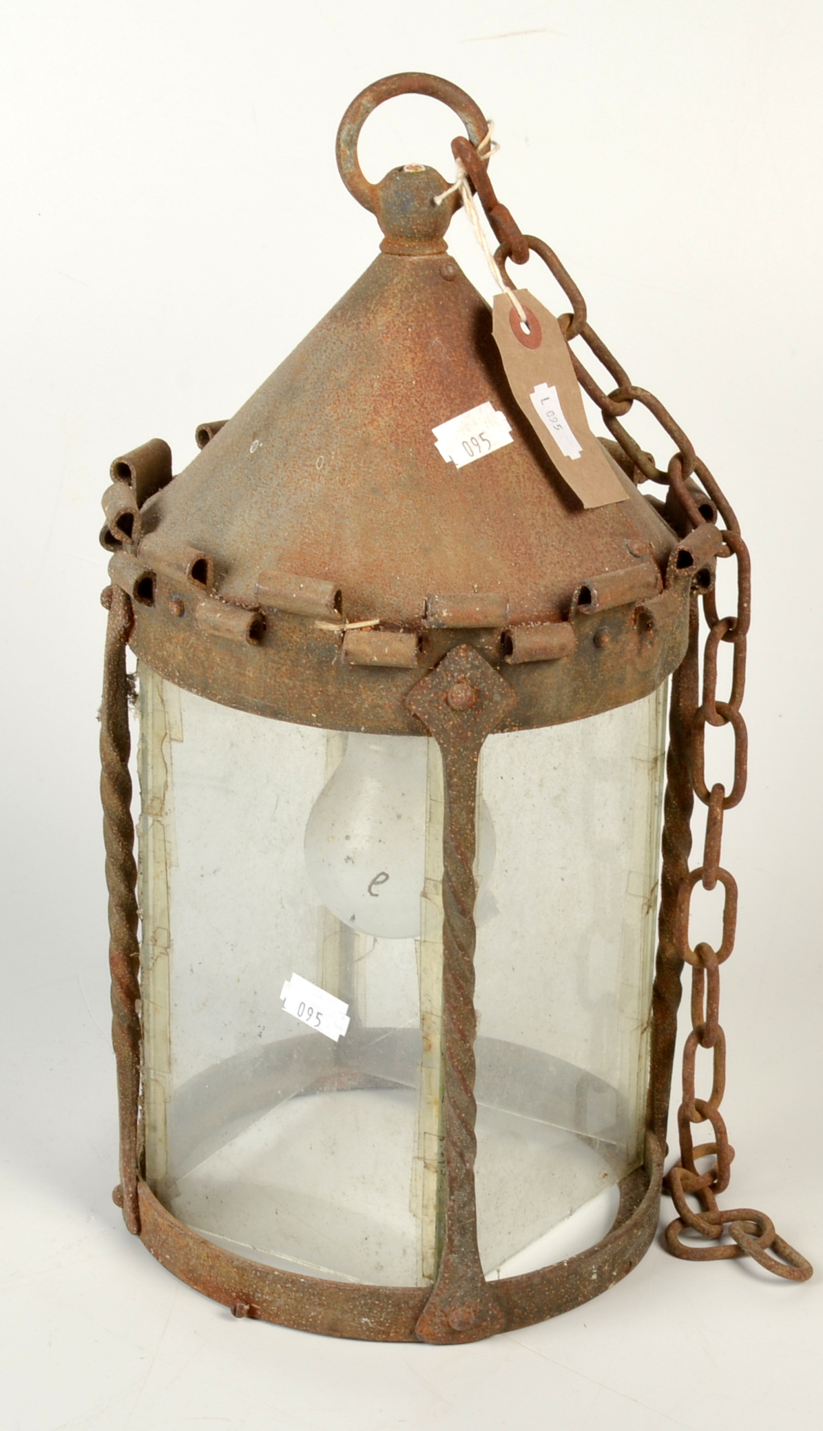 An Arts and Crafts wrought iron hall lantern, maximum height 37cm.