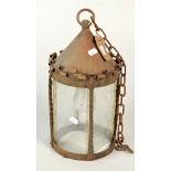 An Arts and Crafts wrought iron hall lantern, maximum height 37cm.