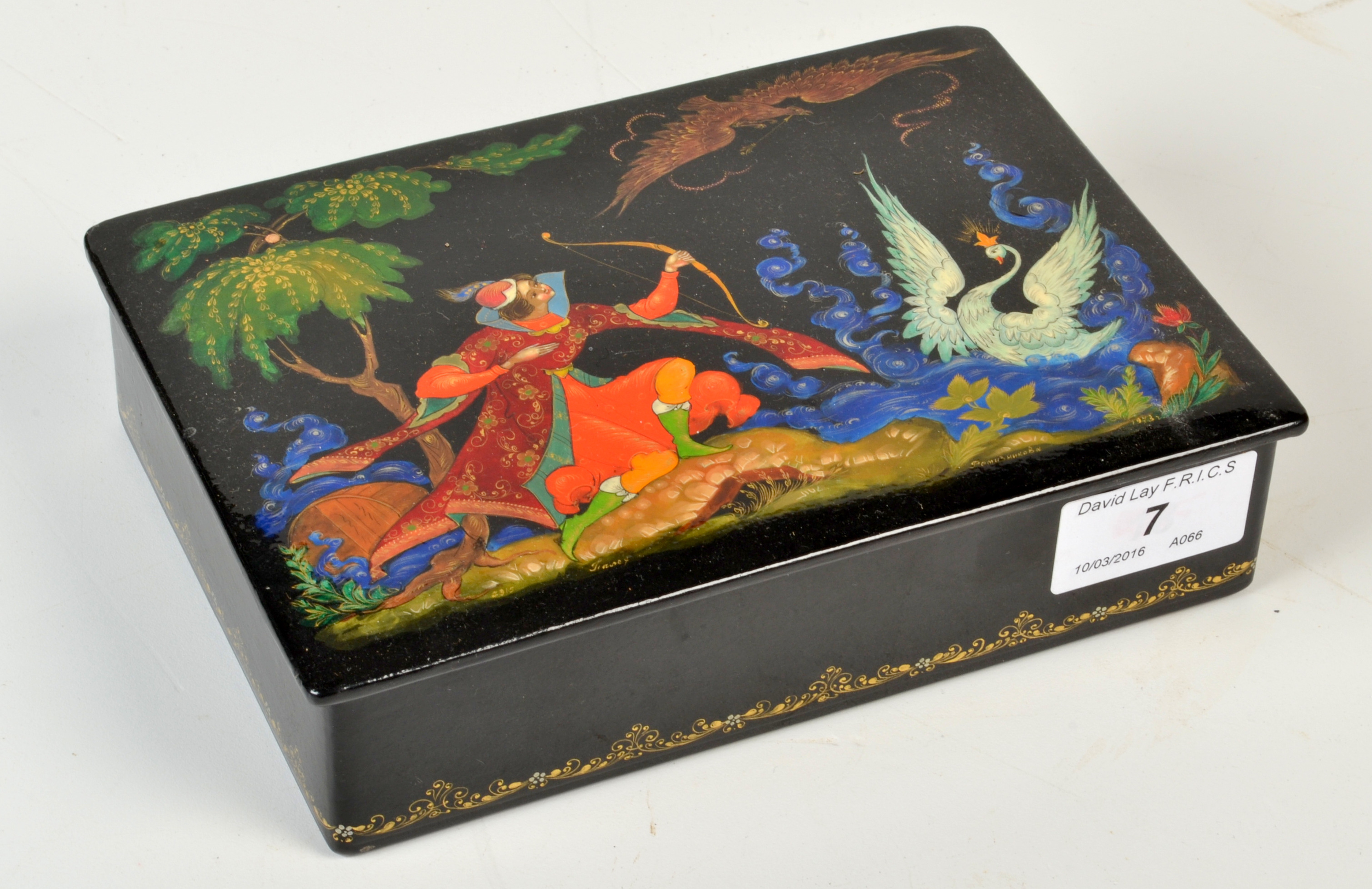 A Russian lacquer box painted with a scene from the fairy tale `The Swan Princess`, signed Tianex