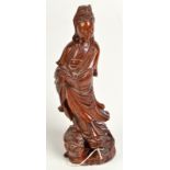 A Chinese carved wood figure of Quan Yin,