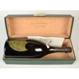 A bottle of 1988 vintage Cuvee Dom Perignon champagne in presentation box.