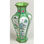 A Chinese enamel vase with famille verte type coloured decoration,