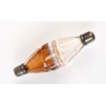 A rare Georgian dual chambered scent bottle in cut glass with conical end sections and plain silver