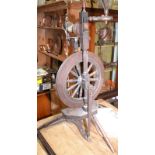 An 18th century spinning wheel by John Dunn, maker's mark impressed twice,