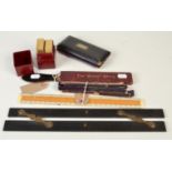 An early 20th century Gillette 'Safety Razor Blade Stropper' and Army Strop, a parallel rule,