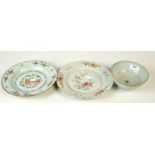 Two Chinese 18th century floral enamel export plates and one other piece. Condition Report: