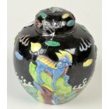 A Chinese famille noir ginger jar and cover moulded with fantastic beasts, with lid, moulded mark .