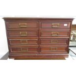 An early 20th century walnut office chest with two tiers of four drawers, width 90cm, height 57cm.