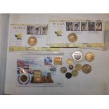 Four modern British £5 coins, two in stamp covers, £2 coins etc.