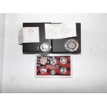 Canada:- A $20 silver maple leaf, 1972 silver crown each cased and a 2004 U.S.