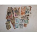 Bank notes including two British £5 with slight mis-cut.