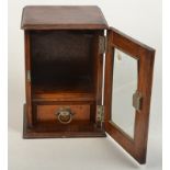 An Edwardian oak smokers cabinet, height 26cm.