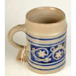 A Rhinish blue salt glaze stoneware mug with the crowned initials GR. 15.5cm.