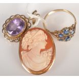 A gold sapphire dress ring, a gold mounted cameo brooch/pendant and a gold mounted amethyst pendant.