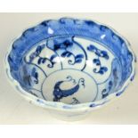 A Chinese Ming bowl decorated with a centralised,