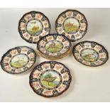 A set of eight Spode bird decorated plates, together with two other plates.