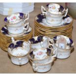 A Coalport late Edwardian tea service comprising of twelve cups and twelve saucers,