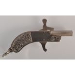 A miniature pistol with engraved nickel grip.