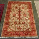 A Ziegler style carpet, machine made,