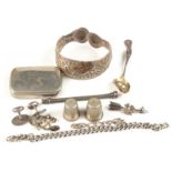 An American nickel vesta case, a pair of silver cuff links, a silver bangle inscribed Tunis 1943,