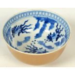 A Chinese blue and white bowl decorated to the interior with fan tailed goldfish,