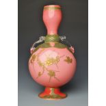 A good Victorian pink overlaid glass, Japanese influenced vase with twin clear handles,