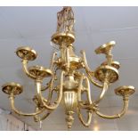 A pendant brass chandelier in classical style with two tiers of six branches with Art Nouveau style